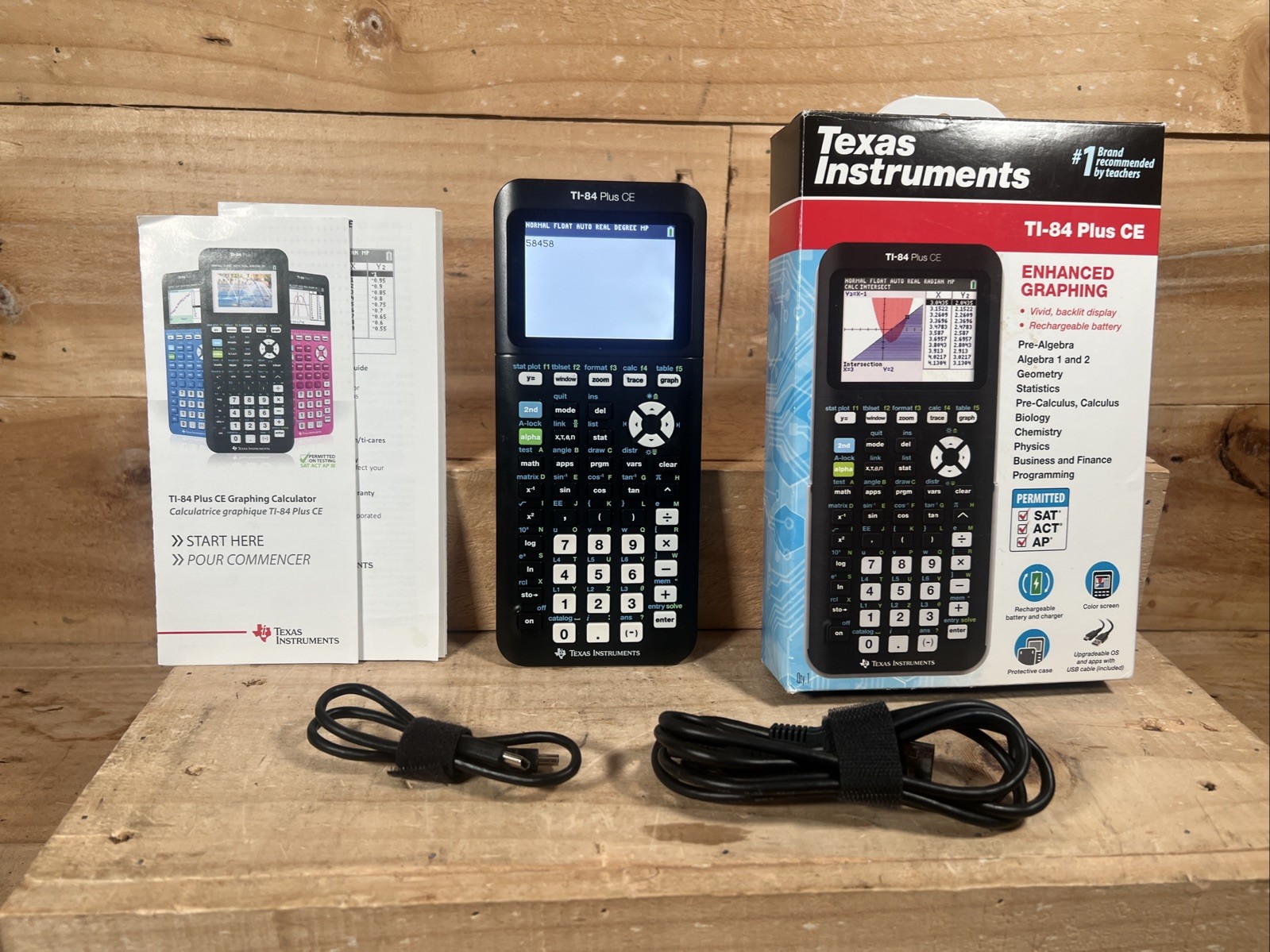 Texas Instruments TI-84 Plus CE Graphing Calculator White. 2 cords, manual, box